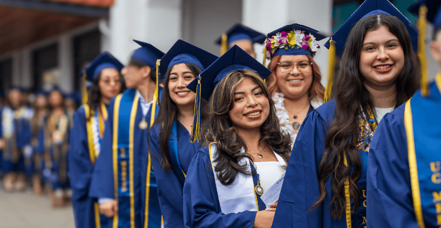Line of UC Merced graduates in cap and gown